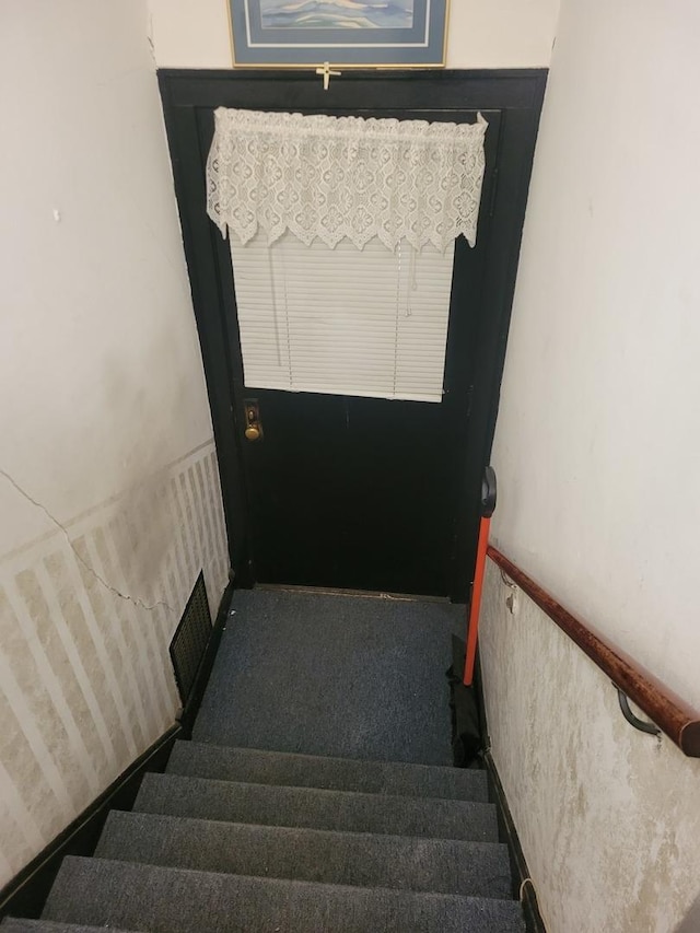 stairway with wainscoting