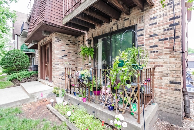 property entrance featuring central AC