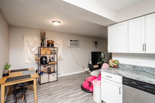 kitchen with dishwasher, backsplash, white cabinets, and light hardwood / wood-style floors