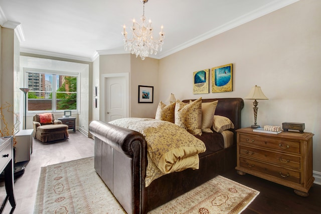 bedroom featuring ornamental molding, a chandelier, and hardwood / wood-style floors