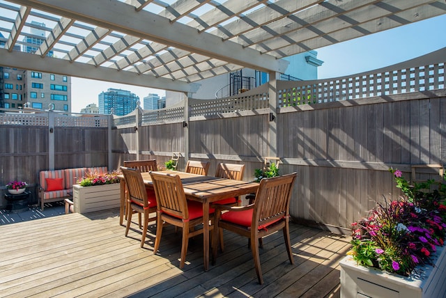 wooden deck featuring a pergola