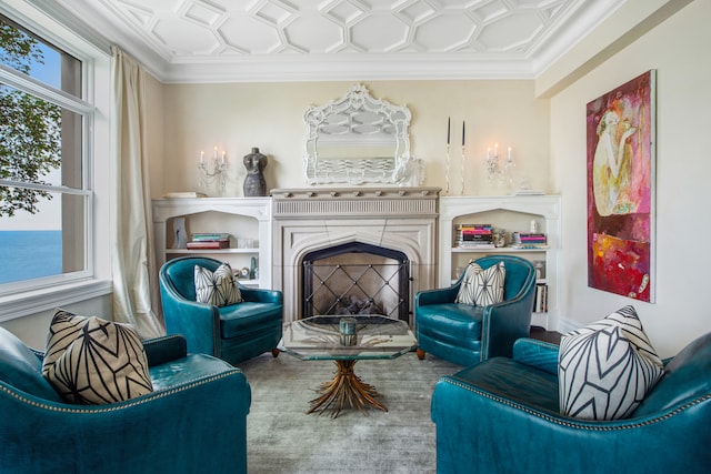 living area featuring crown molding