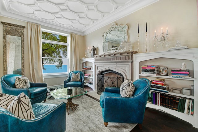 living area featuring ornamental molding and hardwood / wood-style floors