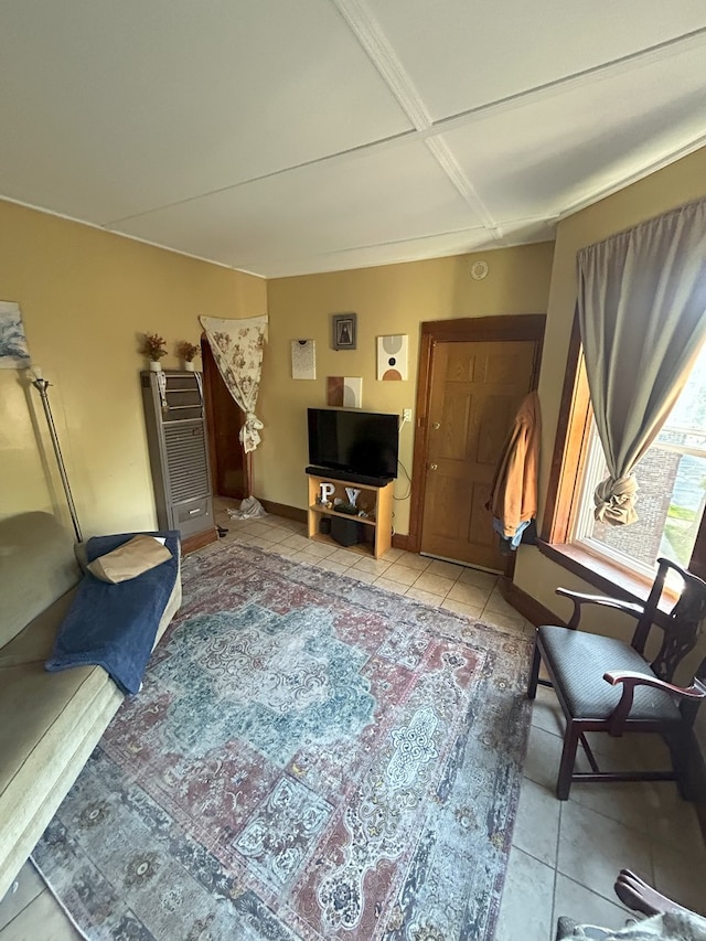 living area featuring tile patterned floors