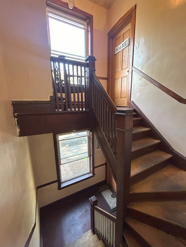 staircase with a healthy amount of sunlight