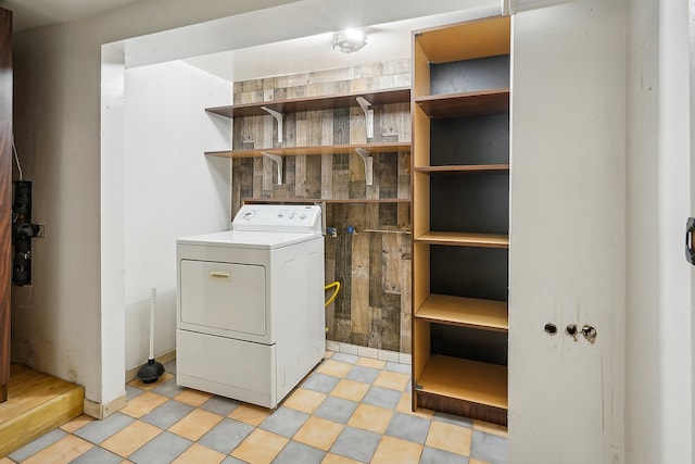 washroom with washer / clothes dryer