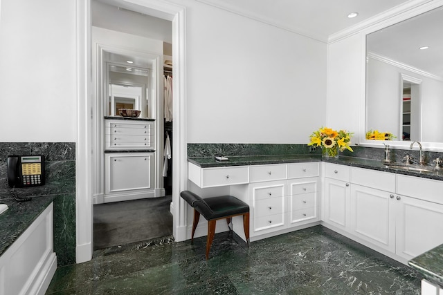 full bathroom featuring vanity, crown molding, a spacious closet, and recessed lighting