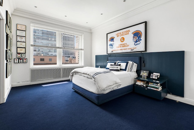 carpeted bedroom featuring baseboards, crown molding, and radiator heating unit