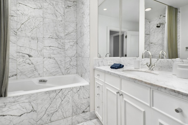 full bathroom with vanity and a combined bath / shower with marble appearance