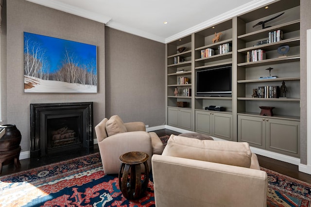 living room with baseboards, dark wood-style floors, a fireplace, and ornamental molding