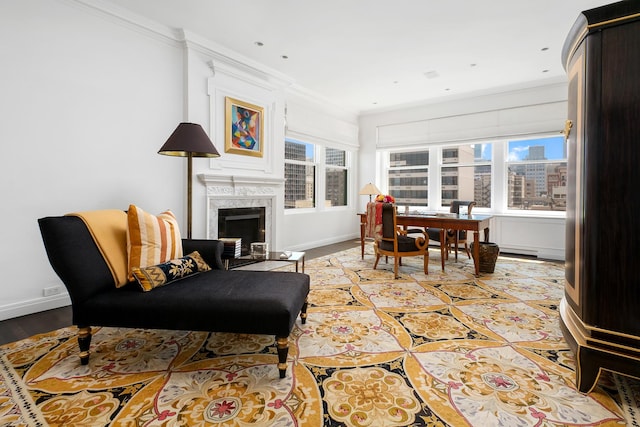 interior space with baseboards, ornamental molding, and a view of city