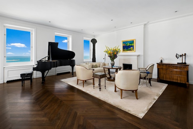 interior space featuring crown molding, a fireplace, and baseboards