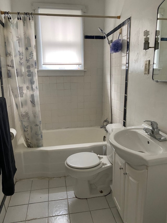 627 Hennepin St, Lasalle, IL 61301 - bathroom featuring tile patterned floors, toilet, vanity, and shower / bath combination with curtain