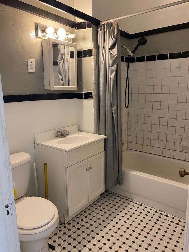 627 Hennepin St, Lasalle, IL 61301 - bathroom featuring toilet, shower / bath combo with shower curtain, and vanity