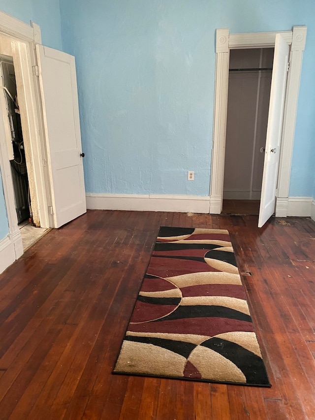 627 Hennepin St, Lasalle, IL 61301 - bedroom featuring baseboards and hardwood / wood-style floors