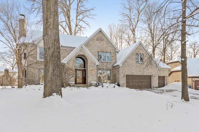 view of front of property featuring a garage