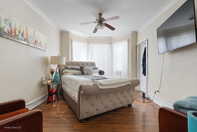 bedroom featuring a baseboard heating unit, ceiling fan, dark hardwood / wood-style floors, and ornamental molding