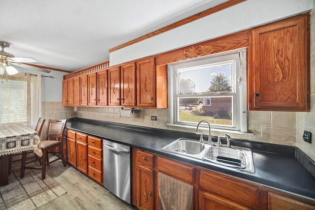 kitchen with decorative backsplash, sink, light hardwood / wood-style floors, stainless steel dishwasher, and ceiling fan