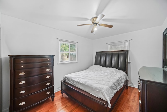 bedroom featuring wood-type flooring and ceiling fan