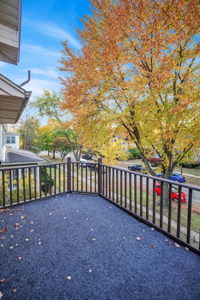 view of patio featuring a balcony