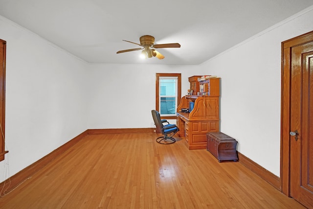 unfurnished room with light hardwood / wood-style floors, ceiling fan, and ornamental molding