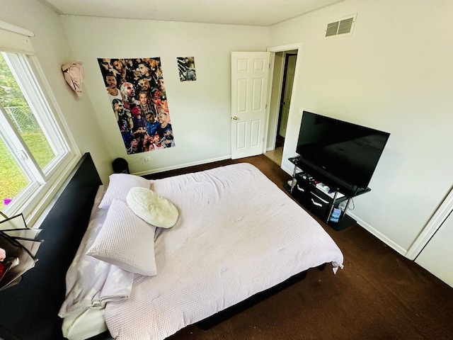 carpeted bedroom with baseboards