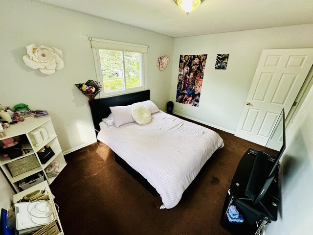 bedroom with baseboards