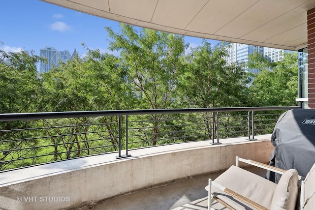 balcony featuring a city view