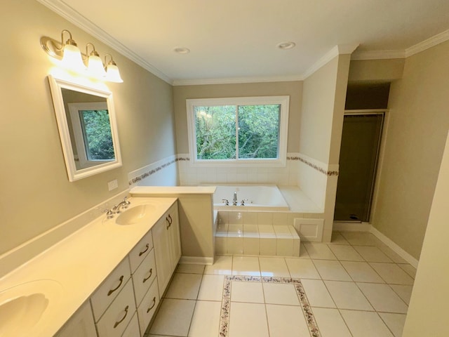 bathroom featuring ornamental molding, vanity, independent shower and bath, and tile patterned floors