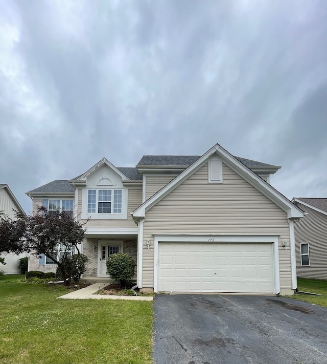 view of property featuring a front lawn