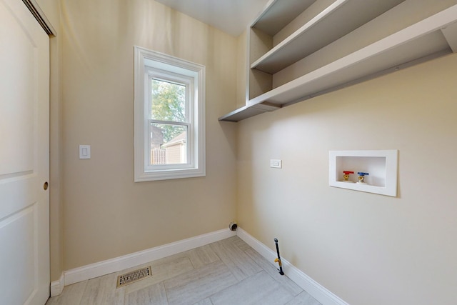 laundry room featuring washer hookup