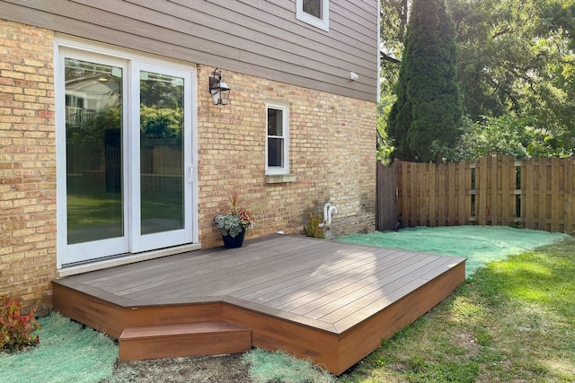 deck featuring a lawn