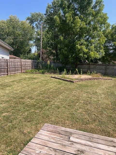 view of yard with a wooden deck