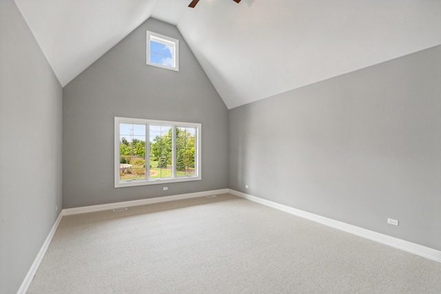 additional living space featuring ceiling fan, lofted ceiling, and carpet floors