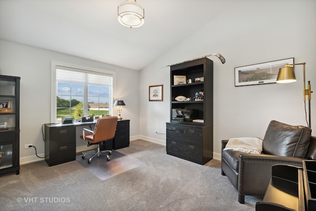 office area with carpet flooring and lofted ceiling