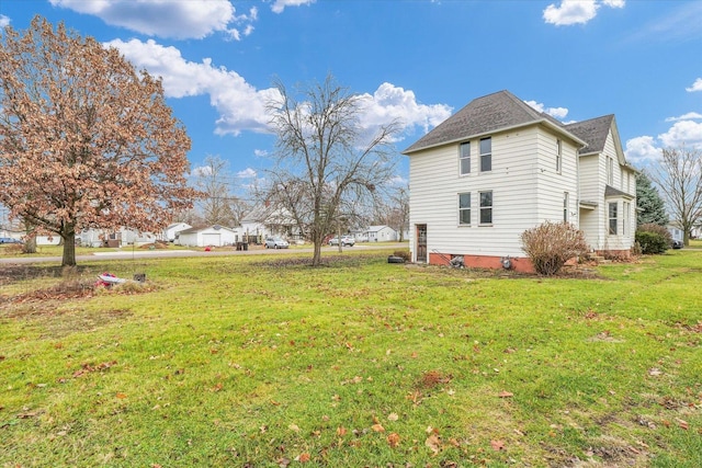 view of home's exterior featuring a yard