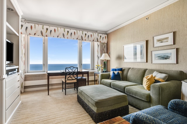 carpeted living room with crown molding, a water view, and a wealth of natural light