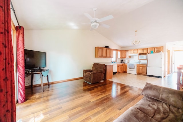 living room with light wood-type flooring, ceiling fan, and vaulted ceiling