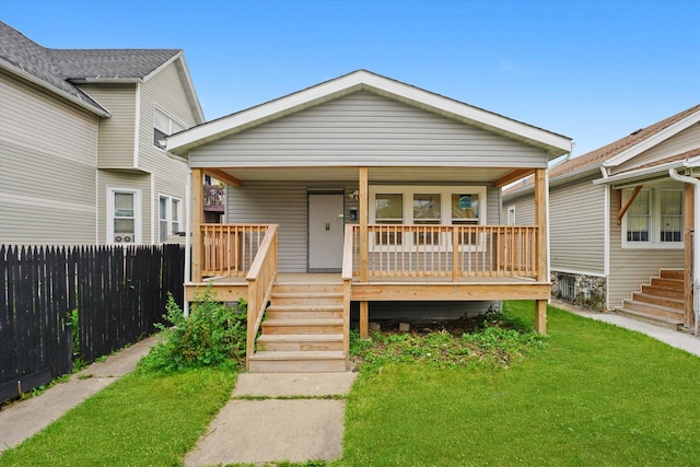 view of front of property featuring covered porch and stairway