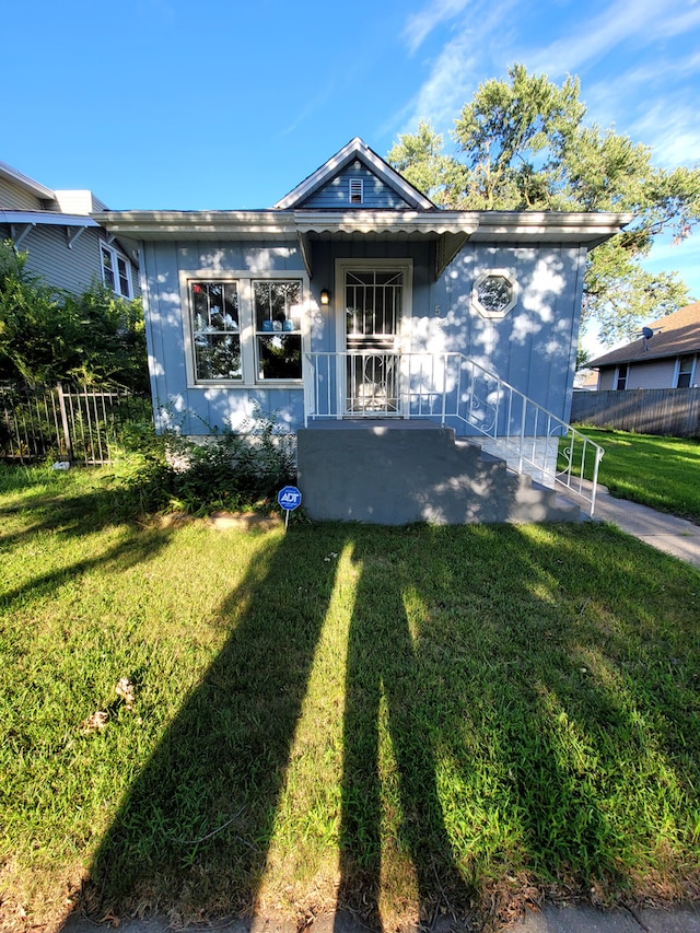 bungalow with a front yard