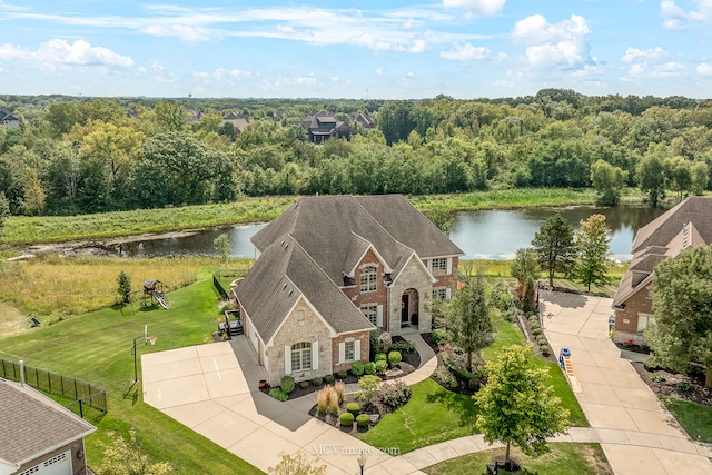 birds eye view of property featuring a water view