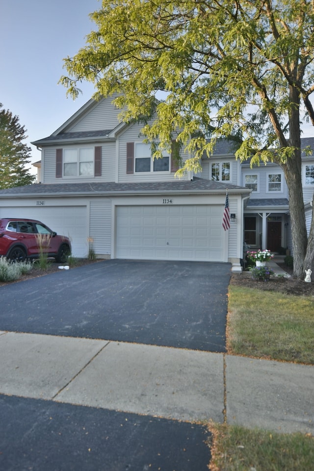 view of property featuring a garage