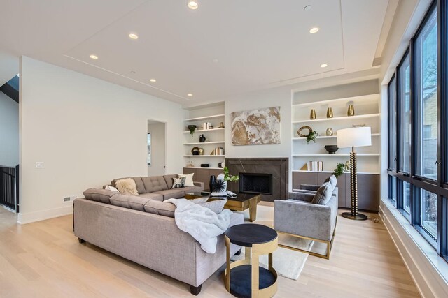 unfurnished dining area featuring plenty of natural light and wood-type flooring