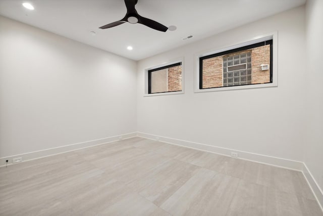 spare room featuring ceiling fan