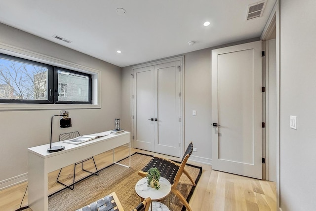 home office with light wood-type flooring