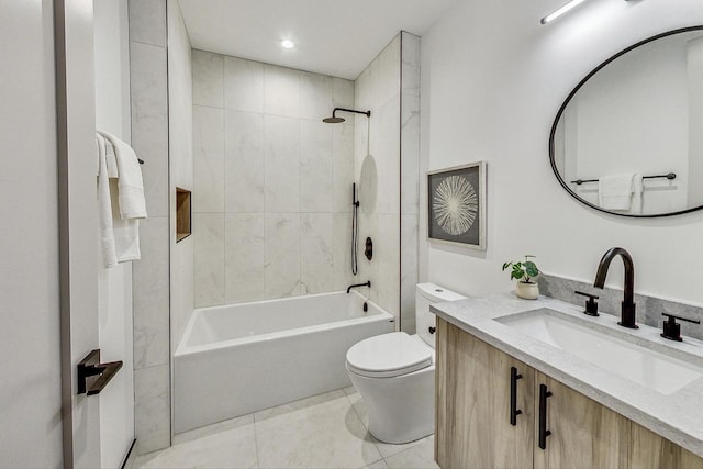 full bathroom featuring tile patterned flooring, vanity, toilet, and tiled shower / bath combo