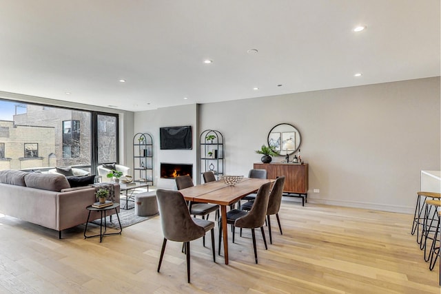 dining space featuring light hardwood / wood-style floors