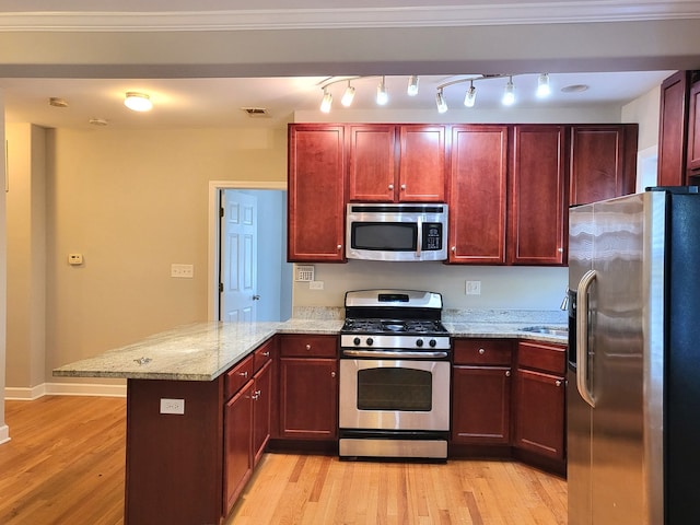 kitchen featuring light stone countertops, appliances with stainless steel finishes, light hardwood / wood-style floors, kitchen peninsula, and ornamental molding