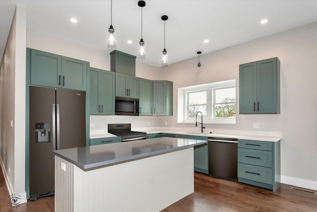 135 W 18th St, Lockport, IL 60441 - kitchen featuring stainless steel appliances, a sink, pendant lighting, a center island, and recessed lighting