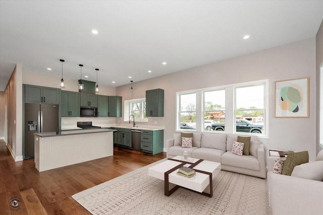 135 W 18th St, Lockport, IL 60441 - living area with dark wood finished floors, recessed lighting, and baseboards